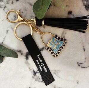Kate Spade Gold and Black Keychain with Blue Charm